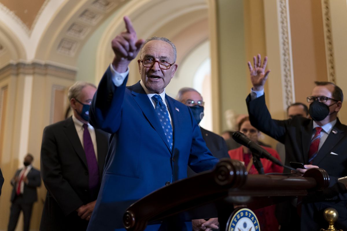 Senate Majority Leader Chuck Schumer, D-N.Y., speaks to reporters following a Democratic strategy meeting, at the Capitol in Washington, Tuesday, Nov. 16, 2021.  (J. Scott Applewhite)