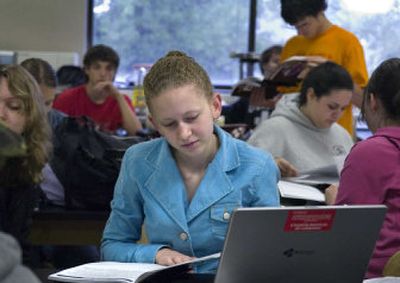 
Student Jessica Harris looks through the North Central High School Journal of Science in teacher Brent Osborn's science class Wednesday morning.
 (Holly Pickett / The Spokesman-Review)