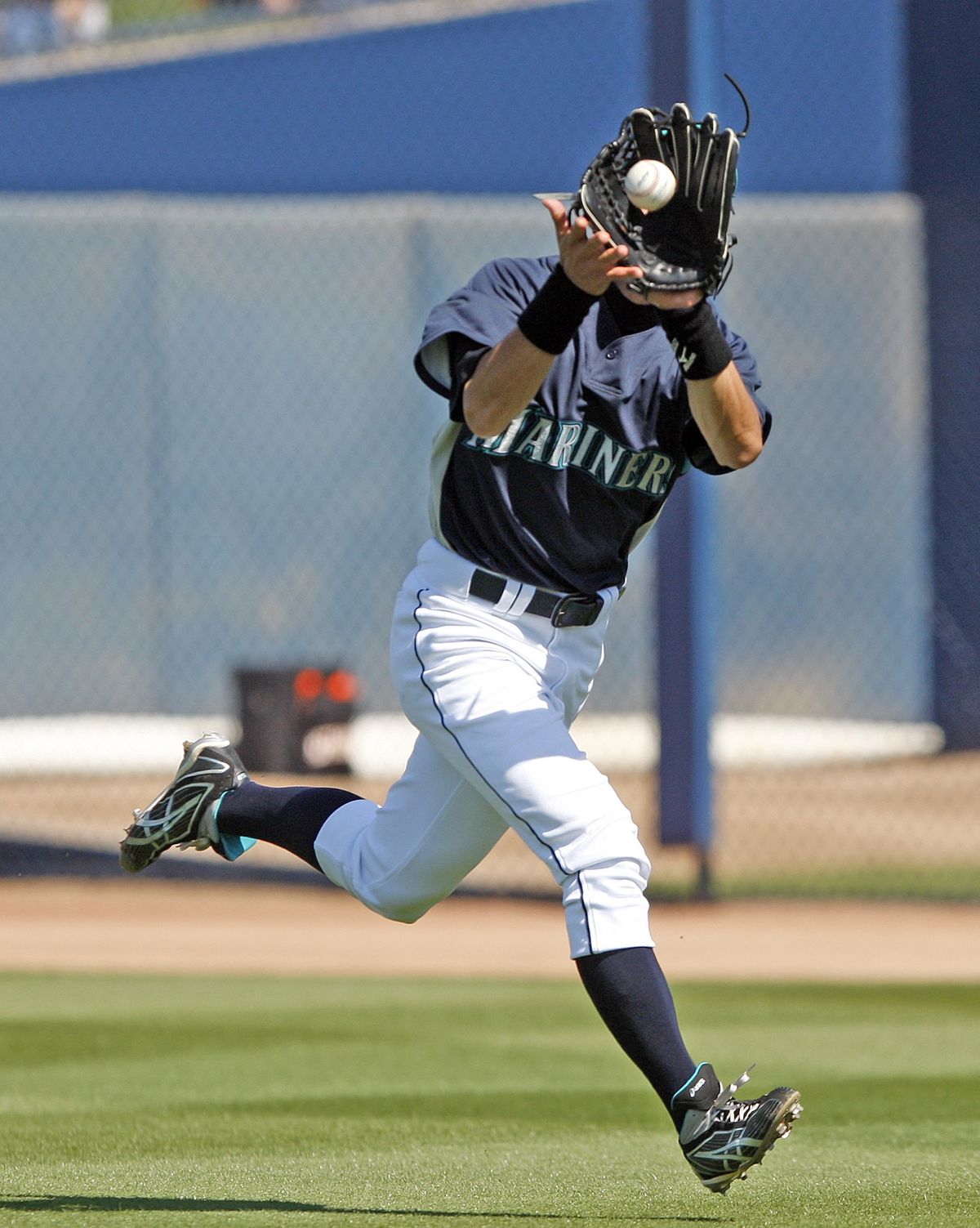 Seattle right fielder Ichiro Suzuki would like to chase down his first playoff appearance since 2001.  (Associated Press)
