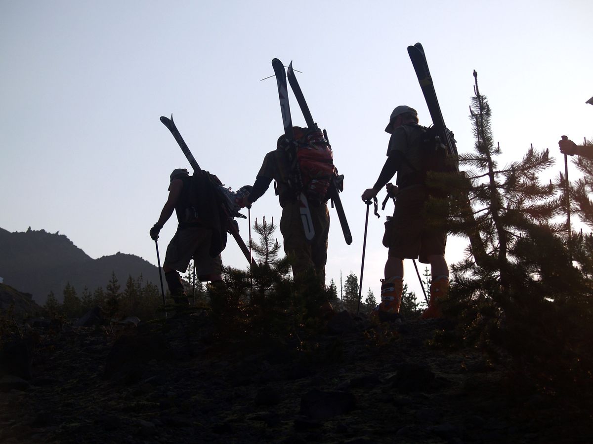 As dawn breaks on July 1, Inland Northwest skiers Tony Rizzuto, Robert Hoskinson and Bill Savitz exit the treeline on their way up to the summit of Mount St. Helens. Photos courtesy of Bob Legasa (Photos courtesy of Bob Legasa / The Spokesman-Review)