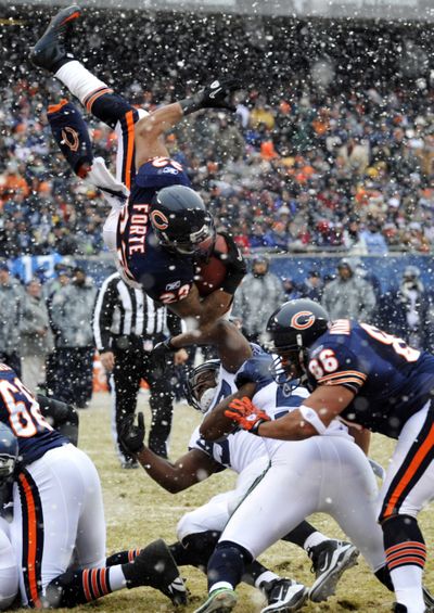 Bears running back Matt Forte comes up short on his dive for the end zone during first-half action Sunday. (Associated Press)