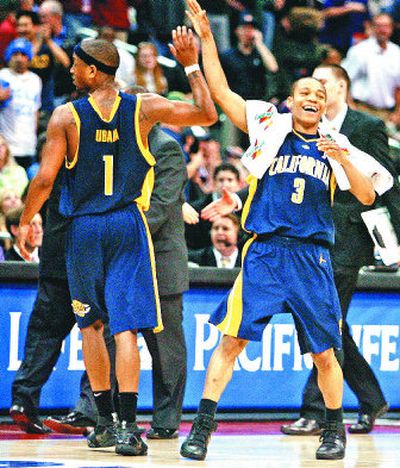 Ayinde Ubaka, left, and Jerome Randle celebrate after Cal beat fourth-ranked UCLA, the Pac-10 tournament's top seed.
(Associated Press / The Spokesman-Review)