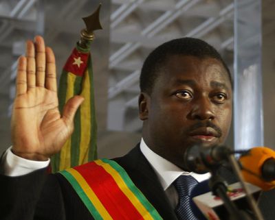 Faure Gnassingbe is seen during his swearing in ceremony as new president of Togo in Lome, Togo on Monday, Feb. 7, 2005. (STR / Associated Press)