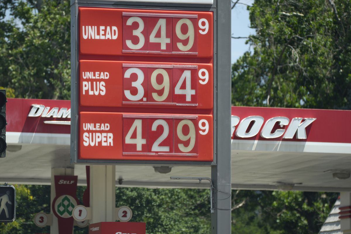 Prices for the three grades of gasoline available are posted outside a Diamond Shamrock station Thursday, July 22, 2021, in Denver. Colorado motorists are dealing with some of the highest prices at the pump in more than decade.  (David Zalubowski)