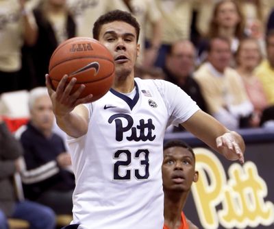 In this Saturday, Feb. 11, 2017, file photo, Pittsburgh's Cameron Johnson (23) shoots after getting by Syracuse's Frank Howard during the first half of an NCAA college basketball game in Pittsburgh. (Keith Srakocic / Associated Press)