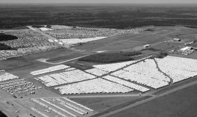 
 Mobile homes and travel trailers owned by the Federal Emergency Management Agency sit at the Hope Municipal Airport near Hope, Ark., on Friday. 
 (Associated Press / The Spokesman-Review)