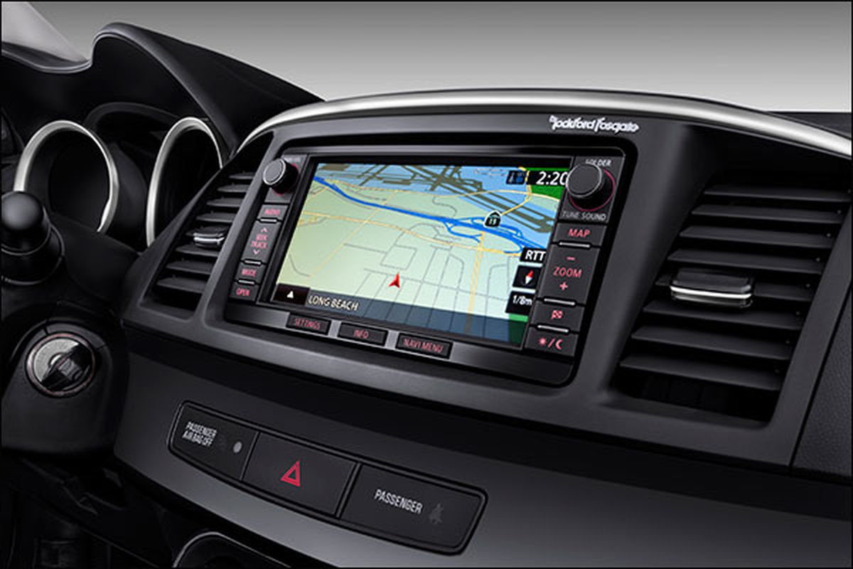 Upper trims adds four-wheel disc brakes, heated front seats and side mirrors, chrome exterior accents and the new 6.1-inch touchscreen audio interface with rearview camera and HD and satellite radio. (Mitsubishi)