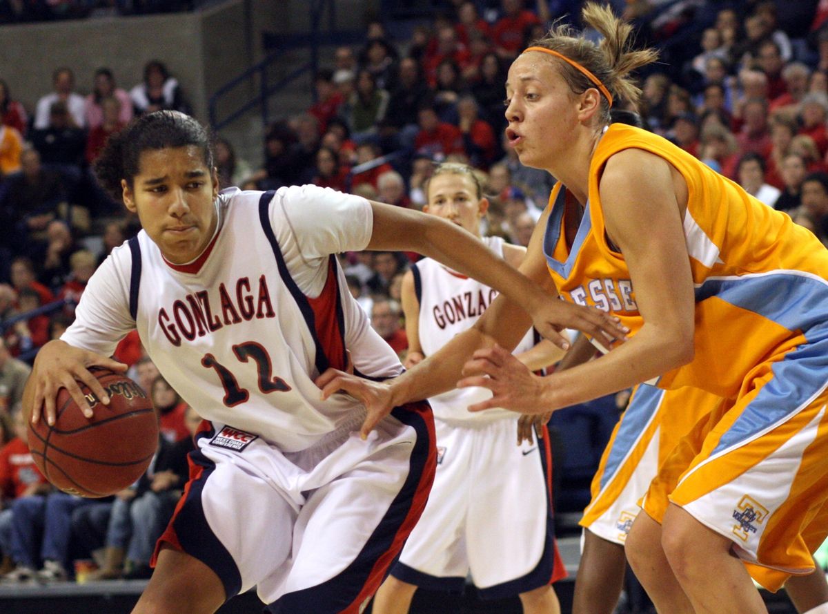 Gonzaga’s Vivian Frieson drives on Angie Bjorklund in the second half. Bjorklund scored 14 points. (Rajah Bose Associated Press / The Spokesman-Review)
