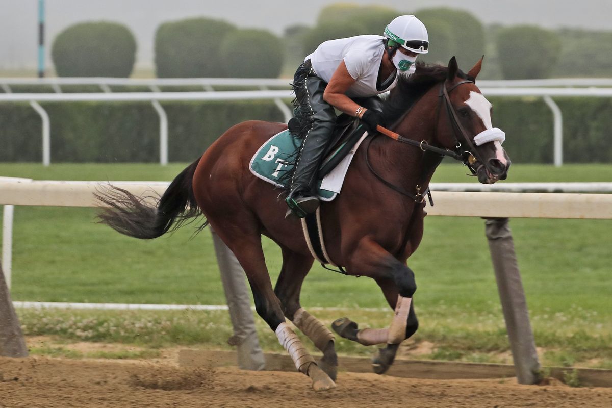 Robin Smullen rides Tiz the Law during a workout at Belmont Park in Elmont, N.Y., on Friday, one day before the Belmont Stakes.  (Associated Press)