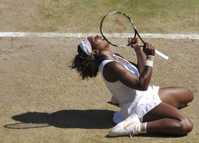 Serena Williams exults after match point Saturday during her Wimbledon women’s singles final against sister Venus.  (Associated Press / The Spokesman-Review)