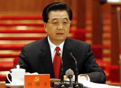 
Chinese President Hu Jintao, seen Sunday at the Communist Party Congress in Beijing, won a second term as the party's leader today. Associated Press
 (Associated Press / The Spokesman-Review)