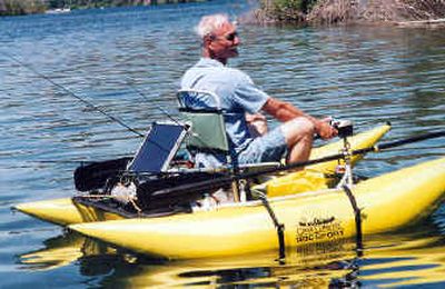 
John Brackemyre of Spokane demonstrates his solar-powered pontoon fishing boat. John Brackemyre of Spokane demonstrates his solar-powered pontoon fishing boat. 
 (Rich Landers/Rich Landers/ / The Spokesman-Review)