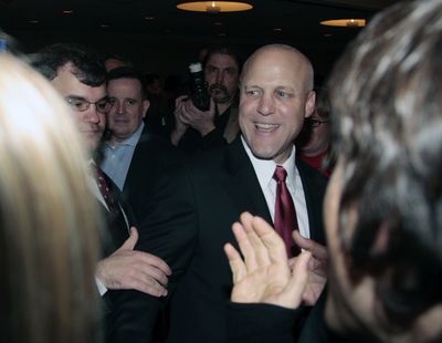 Mitch Landrieu greets supporters at  his election night party in New Orleans on Saturday.  (Associated Press)