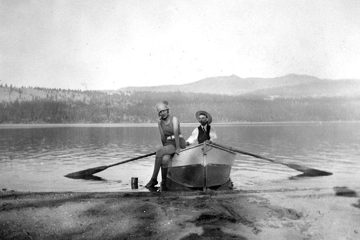 This photo was taken on July 8, 1924, in Liberty Lake. Keo King LaVell poses in a rowboat with her husband, Francis N. LaVell. By the 1920s, women’s bathing costumes reflected the easing of restrictions on women’s fashion in general. “Bathing costumes” no longer had to include long sleeves, black hose, legs covered to the knees. Though Keo’s swimsuit could pass for a modern and modest summer dress, back then it reflected the modern era in swimsuits.