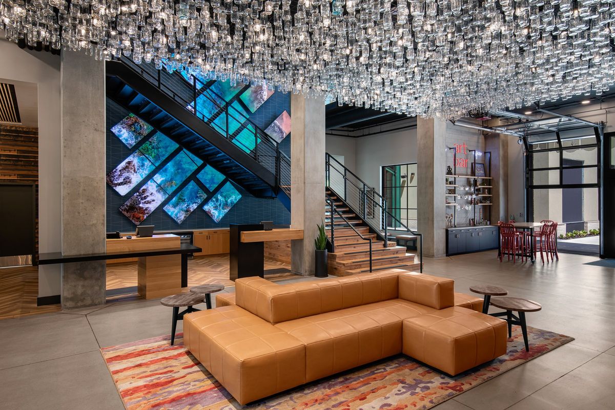 Behind the stairs in the lobby of the Gordon Hotel in Eugene, Ore., is the “Great Wall,” a large-scale digital art installation that was undertaken in partnership with art collective Harmonic Laboratory.  (The Gordon Hotel)