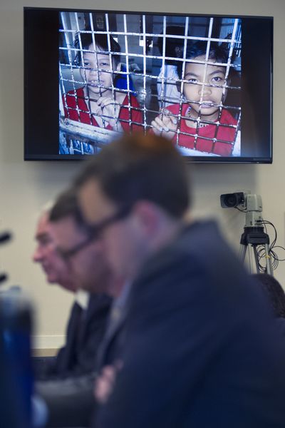 A photograph of imprisoned Philippine children is shown as witnesses testify before the House Committee on Foreign Affairs subcommittee on Africa, Global Health, Global Human Rights, and International Organizations hearing on the fight against human trafficking Wednesday in Washington, D.C. (Associated Press)