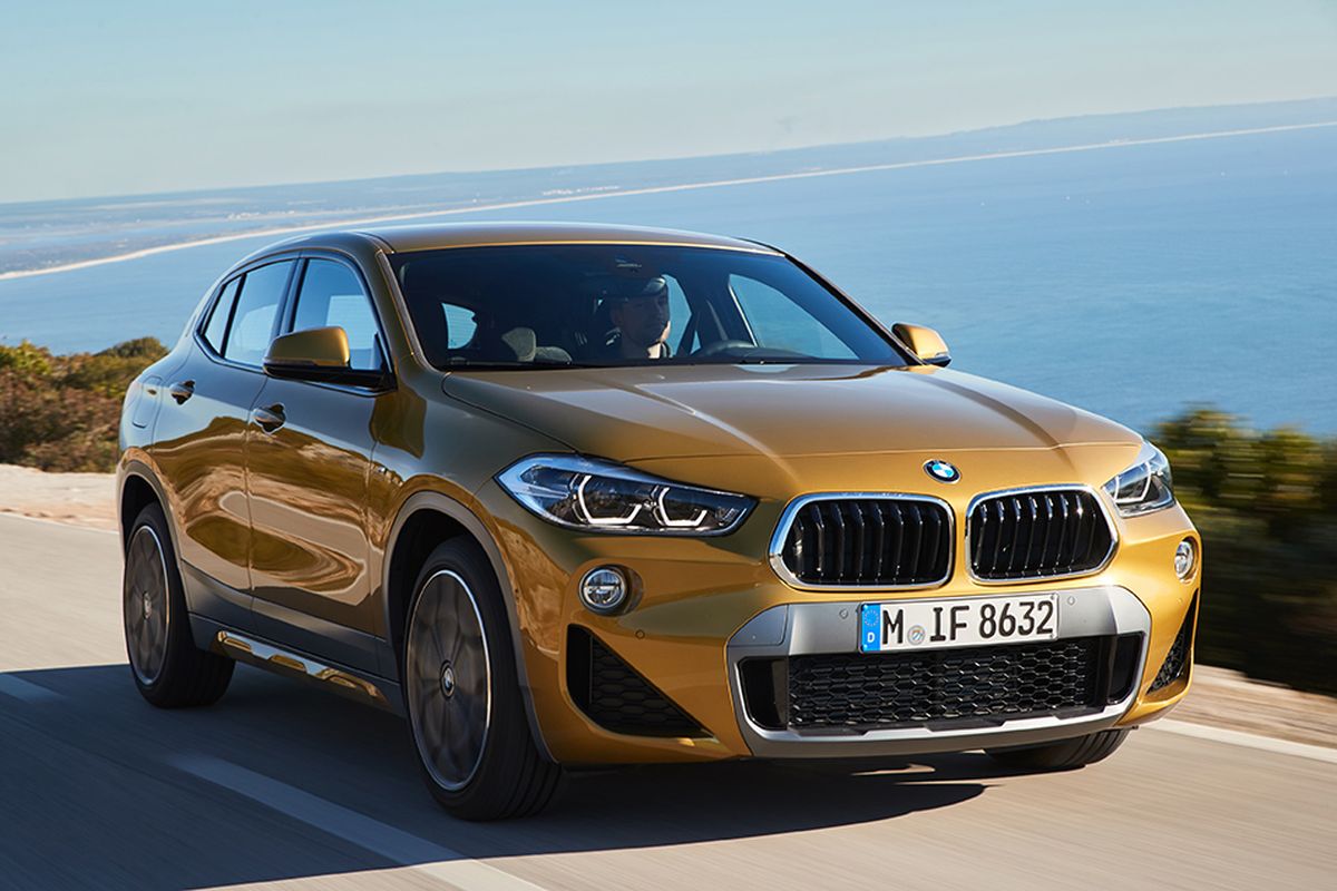 Outside, the X2 shares nearly none of its sibling’s sheet metal. Its sweeping, coupe-like roofline terminates in a spoiler that underscores the fluidity of the X2’s silhouette.  (BMW)