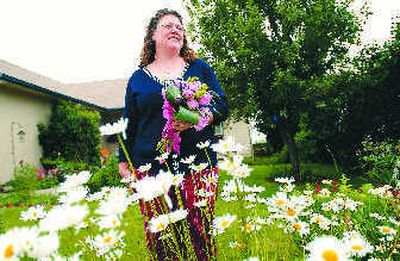 
Angela Hagadorn's business, Pistil Packin Posies, is right on target. Page 12.
 (The Spokesman-Review)