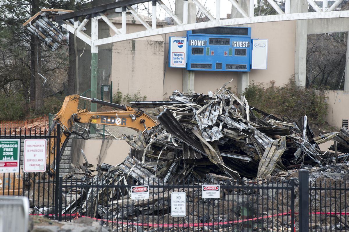 The remnants of the Ice Palace roof lays on the ground beneath the Pavilion in Riverfront Park, Friday, Jan. 26, 2018. (Jesse Tinsley / The Spokesman-Review)