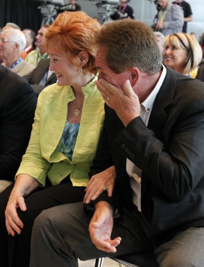 An emotional Darrell Waltrip, right, with his wife Stevie, wipes away a tear after being voted into the NASCAR Hall of Fame. (Associated Press)