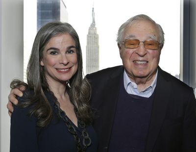 Arthur Former, 87, right, poses with his daughter, Pauline, in New York. (Peter Morgan / AP)