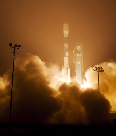 A Delta 2 rocket with the Orbiting Carbon Observatory-2 satellite launches at Vandenberg Air Force Base, Calif., Wednesday morning. (Associated Press)