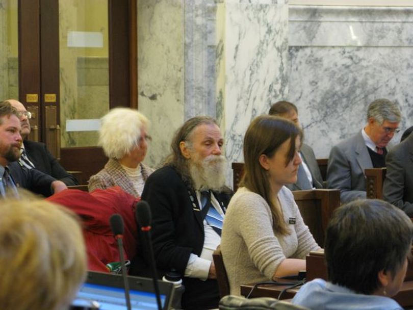 Alfred Rogalsky, a 73-year-old from Alberta, Canada, shown at center here, has been observing from the front row of the audience at the Joint Finance-Appropriations Committee for weeks as part of his 