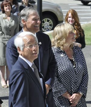 OLYMPIA -- Gov. Jay Inslee and his wife Trudi welcome Hyogo Prefecture Gov. Toshizo Ido to a ceremony marking the 50th anniversary of a sister-state relationship between the two areas. (Jim Camden)