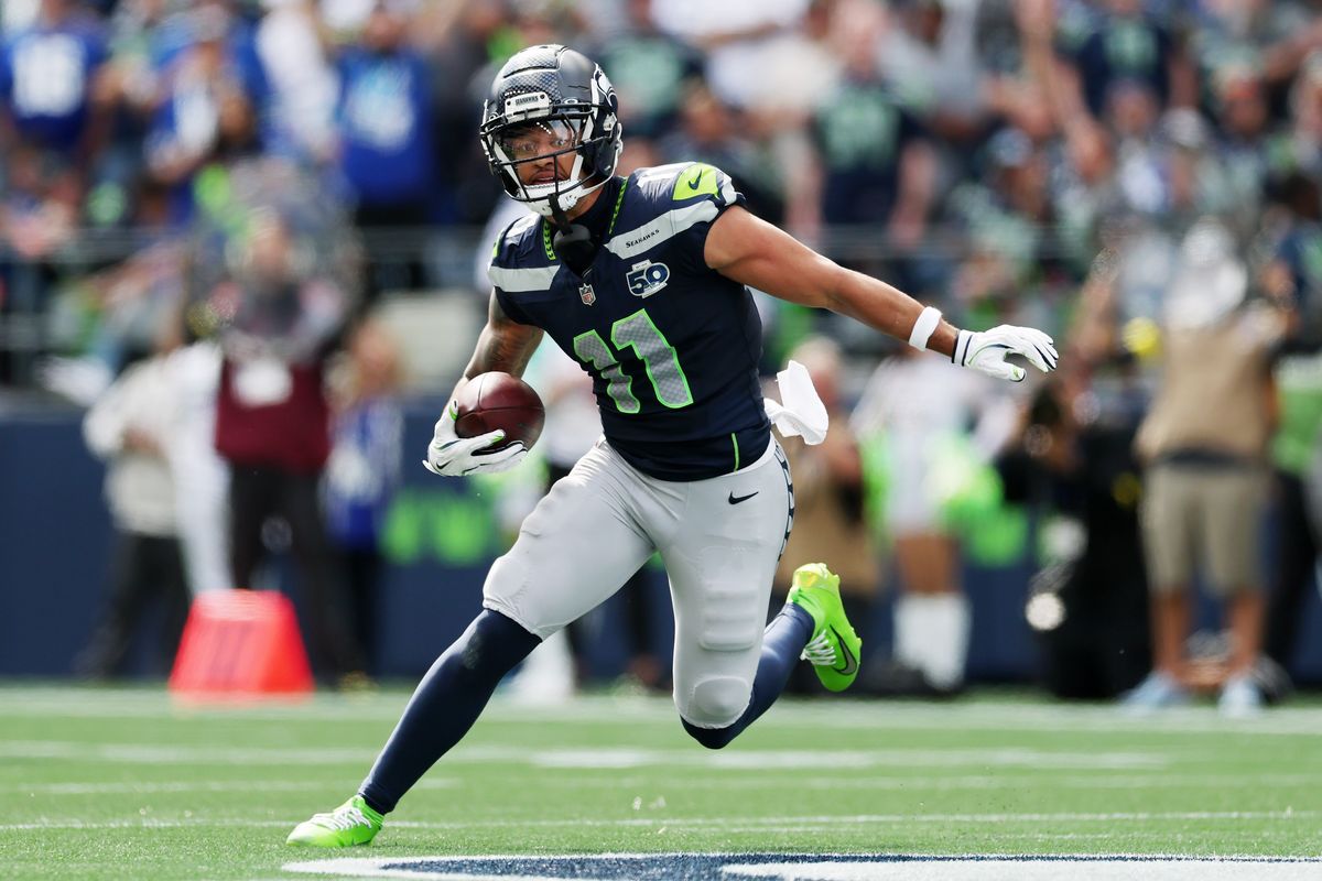Seattle Seahawks WR Jaxon Smith-Njigba, above, caught nine of quarterback Sam Darnold’s 16 completions in their season opener, an offense that appeared too one-dimensional. DK Metcalf, right, had four catches for 84 yards in his Steelers debut.  (Getty Images)