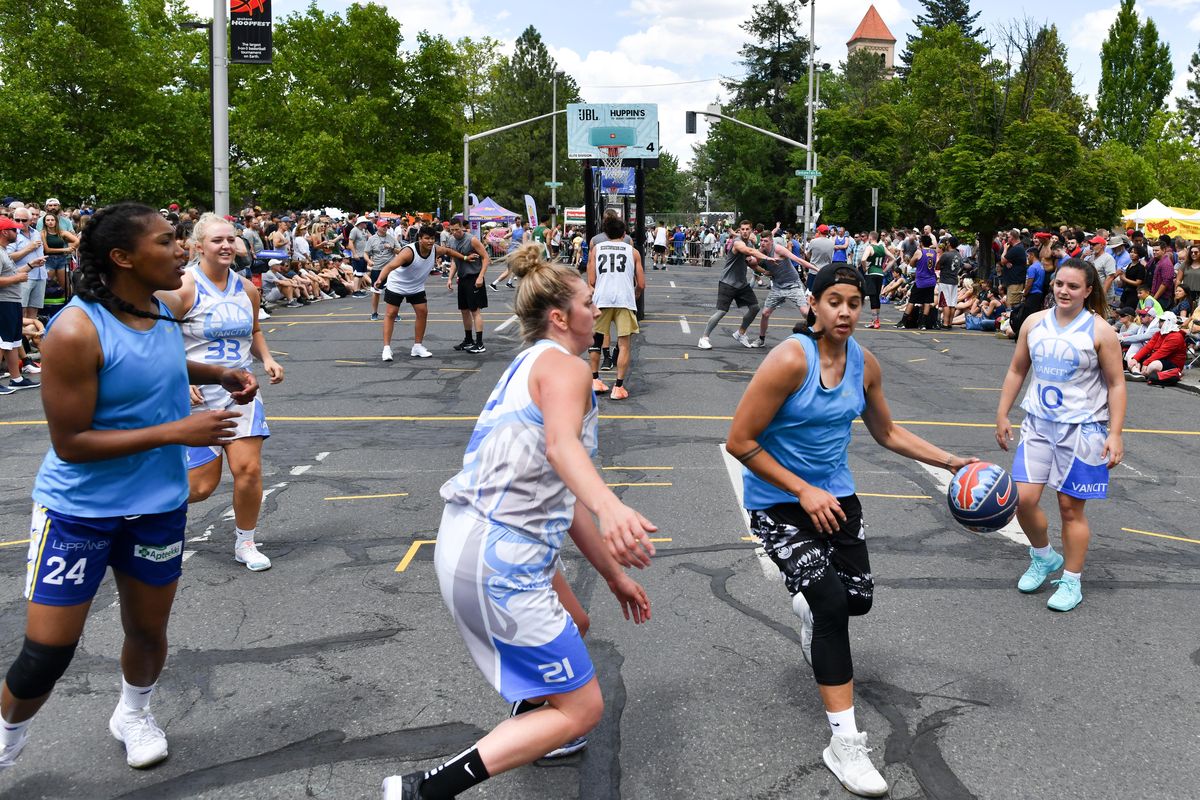 Shoni Schimmel, playing for the team All Rez, drives against Vancity during Hoopfest on Saturday  in Spokane. (Tyler Tjomsland / The Spokesman-Review)