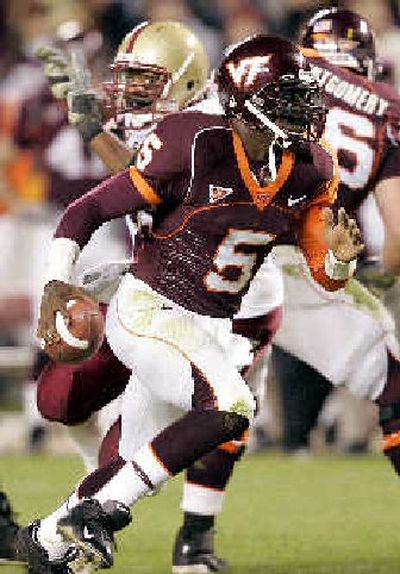 
Quarterback Marcus Vick has the Virginia Tech Hokies headed for a BCS bowl and a possible shot at the national championship.
 (Associated Press / The Spokesman-Review)