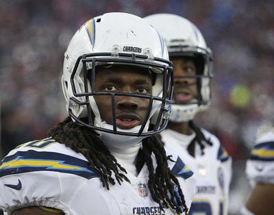 In this Jan. 13, 2019  photo Los Angeles Chargers running back Melvin Gordon watches from the sideline during the second half of an NFL divisional playoff football game against the New England Patriots in Foxborough, Mass. Gordon is officially a holdout as the Chargers get ready to begin training camp. The team placed their running back on the reserve/did not report list Wednesday, July 24, 2019 as players went through physicals and meetings. Gordon is going into the final year of a rookie contract and will earn $5.6 million this season. (Steven Senne / Associated Press)