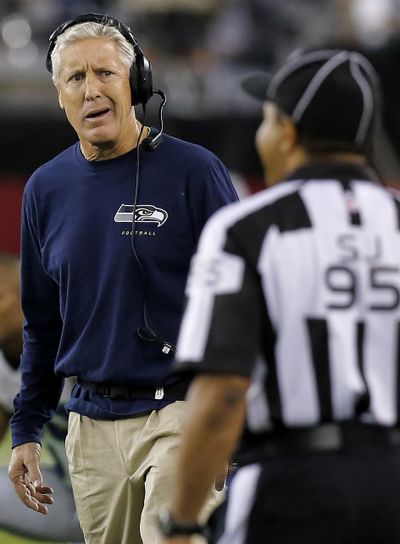 Pete Carroll has the Seahawks playing well, but his team did have its “dumb” moments Thursday. (Associated Press)