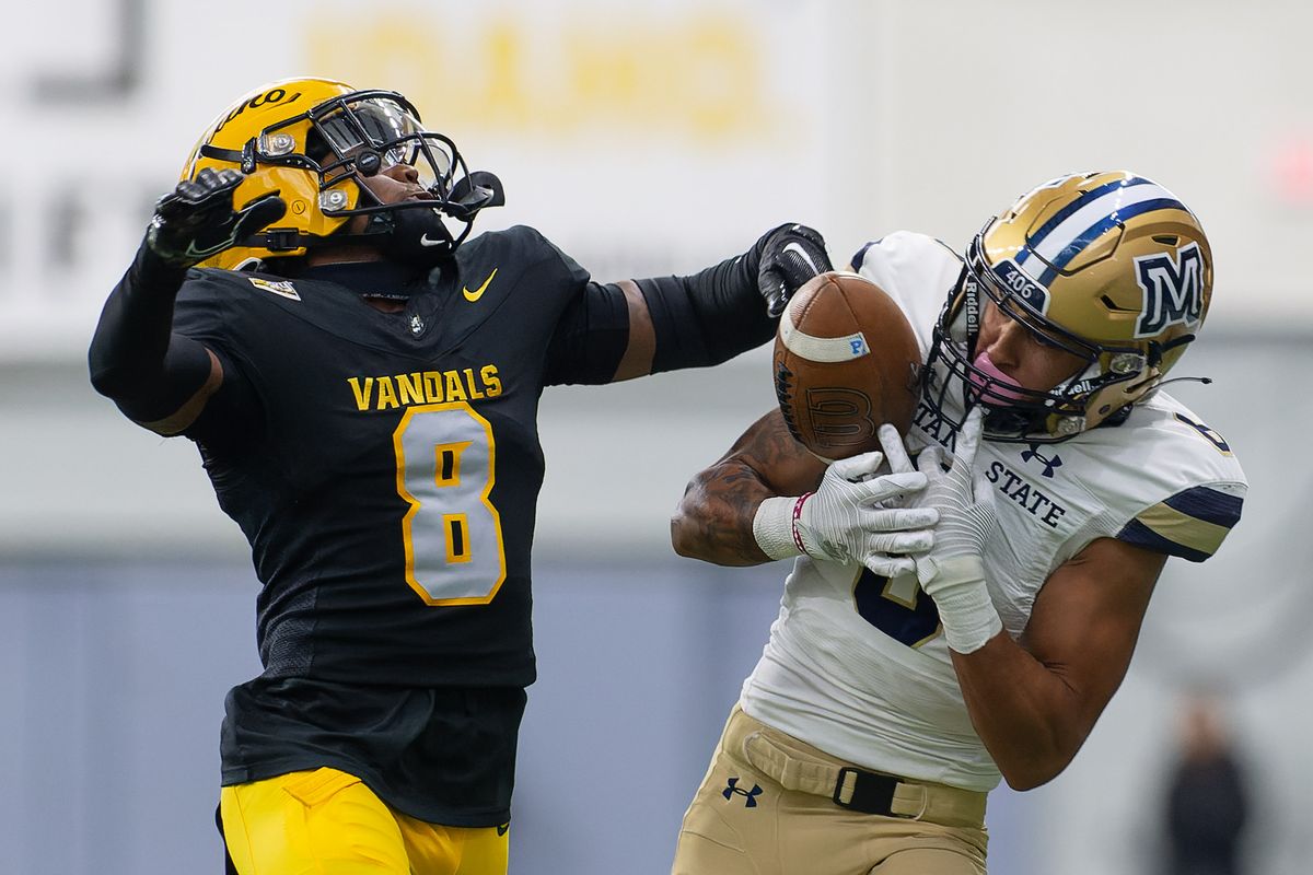 Idaho defensive back Ormanie Arnold, left, breaks up a pass to Montana State wide receiver Ty McCullouch in the first half on Saturday, Oct. 28, 2023, at the Kibbie Dome in Moscow.  (Geoff Crimmins/For The Spokesman-Review)