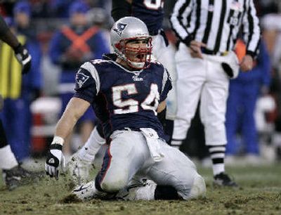 
New England linebacker Tedy Bruschi celebrates after his third-quarter sack against Tampa Bay on Saturday. 
 (Associated Press / The Spokesman-Review)