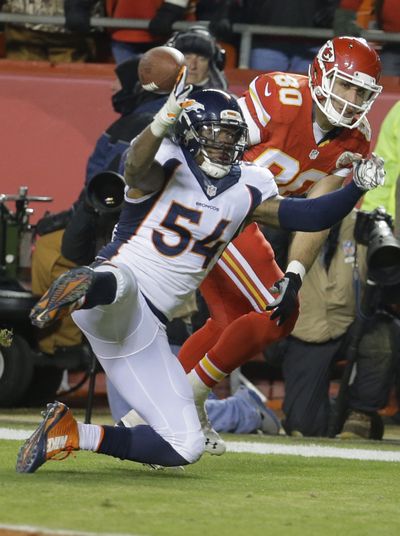 Denver linebacker Von Miller, center, returned to Pro Bowl form this season after disastrous 2013 campaign. (Associated Press)