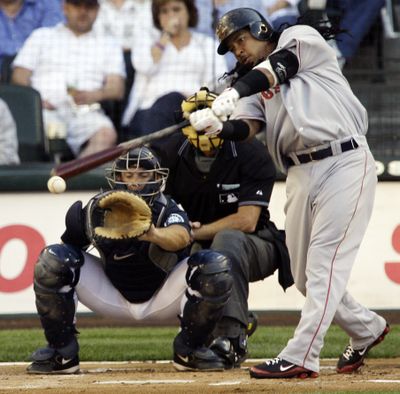 Boston’s Manny Ramirez extended his 10-game hitting streak with three singles against the Mariners on Monday night.  (Associated Press / The Spokesman-Review)