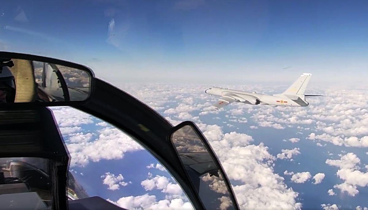 In this photo taken from a video distributed by Russian Defense Ministry Press Service, on Tuesday, Dec. 22, 2020, a Chinese H-6K strategic bomber flies during a joint patrol mission over the Western Pacific. Russian and Chinese bombers flew a joint patrol mission over the Western Pacific Tuesday in a show of increasingly close military ties between Moscow and Beijing. The Russian military said that a pair of its Tu-95 strategic bombers and four Chinese H-6K bombers flew over the Sea of Japan and the East China Sea.  (HOGP)