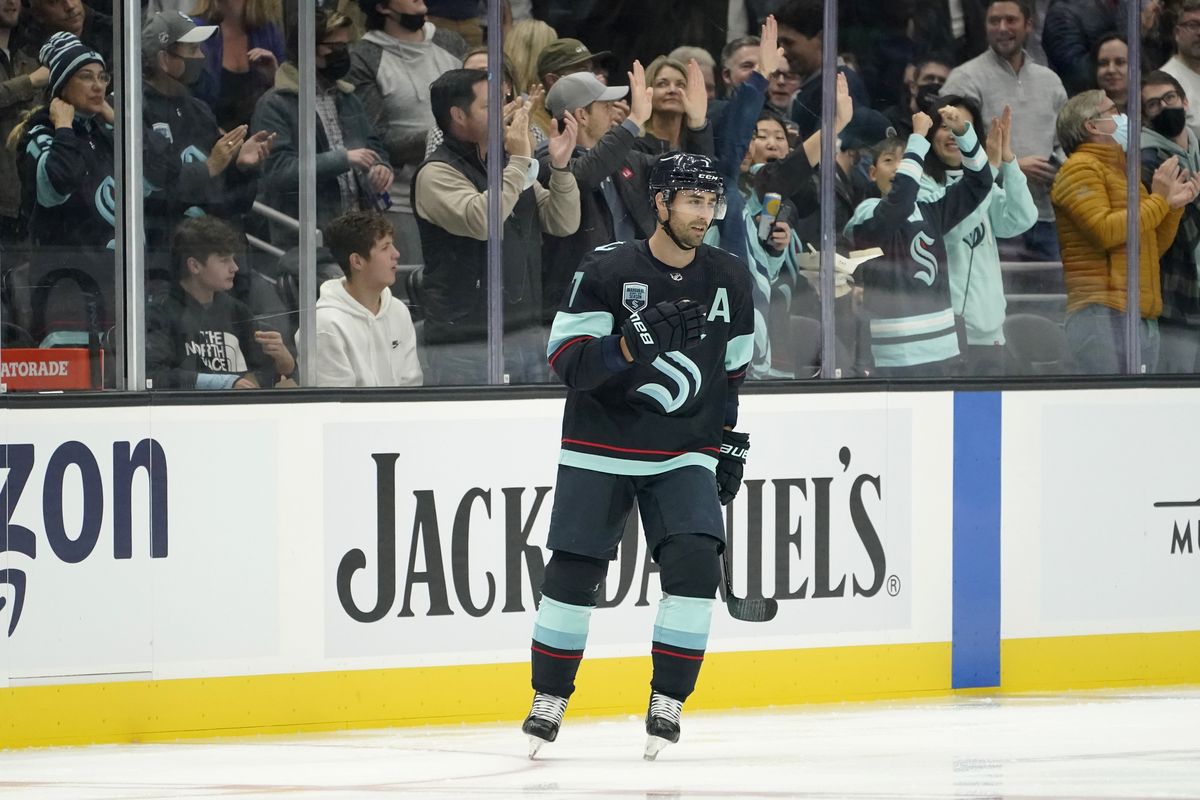 Seattle Kraken right wing Jordan Eberle (7) reacts as fans cheer after he scored a goal against the Montreal Canadiens during the first period of an NHL hockey game, Tuesday, Oct. 26, 2021, in Seattle.  (Ted S. Warren)