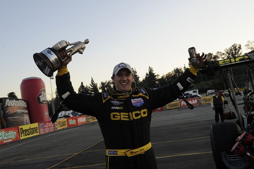 Morgan Lucas shows of his Wally earned at the 2011 NHRA Winternationals held in Pomona, CA. (Photo courtesy of NHRA)