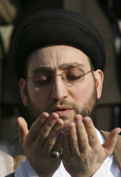 
Ammar al-Hakim leads an Eid al-Fitr prayer service to mark the end of the holy month of Ramadan on Saturday. Associated Press
 (Associated Press / The Spokesman-Review)