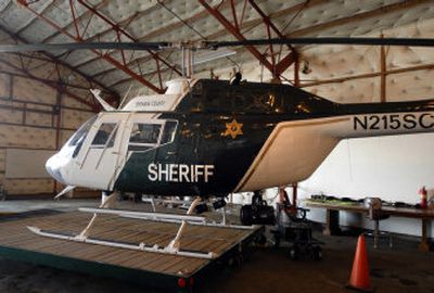 
The recently acquired Spokane County Sheriff's Department helicopter sits in a hanger at Felts Field. 
 (Dan Pelle / The Spokesman-Review)