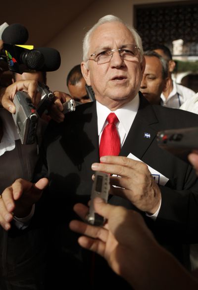 Honduras interim President Roberto Micheletti, shown at a recent news conference, took office following a coup.  (Associated Press / The Spokesman-Review)