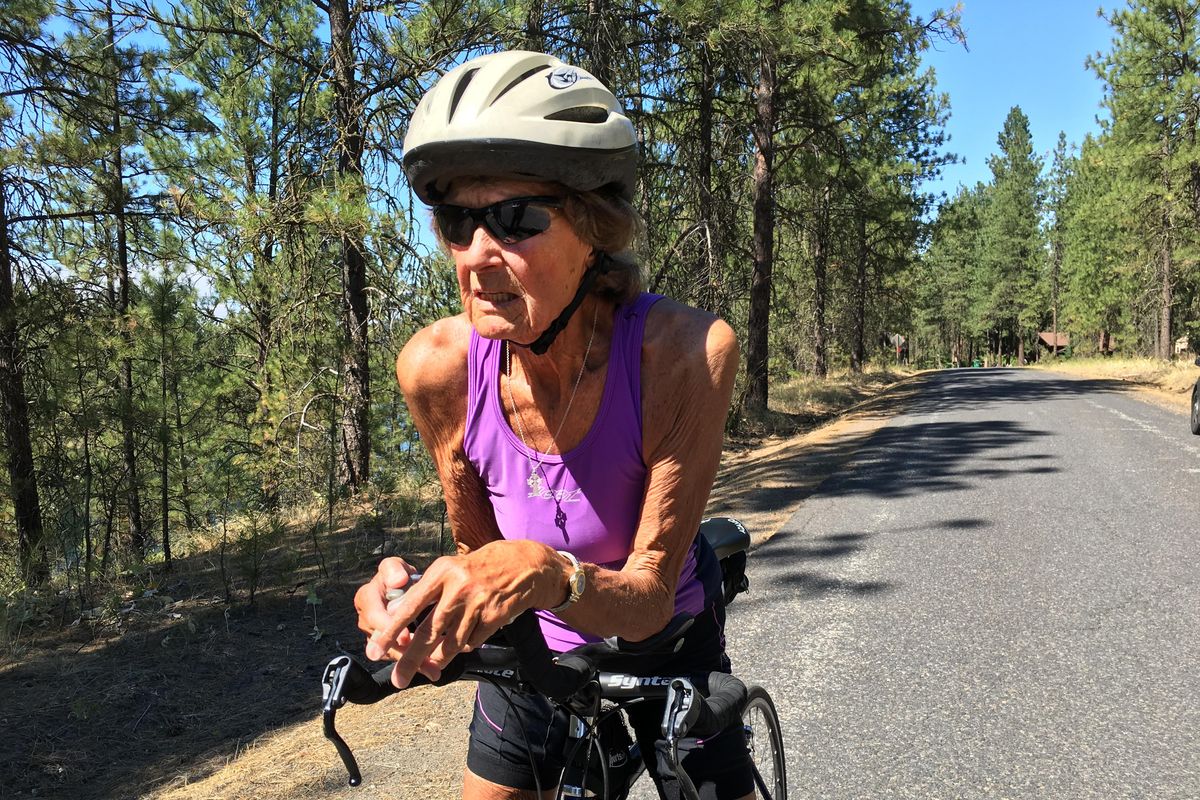 Sister Madonna Buder, a longtime triathlete, runner and swimmer, pauses on the Aubrey White Parkway, Tuesday, July 26, 2016, in Riverside State Park to say she hasn’t seen a problem with speeding bicyclists as park officials have claimed has happened on the Centennial Trail in the park. (Jesse Tinsley / The Spokesman-Review)