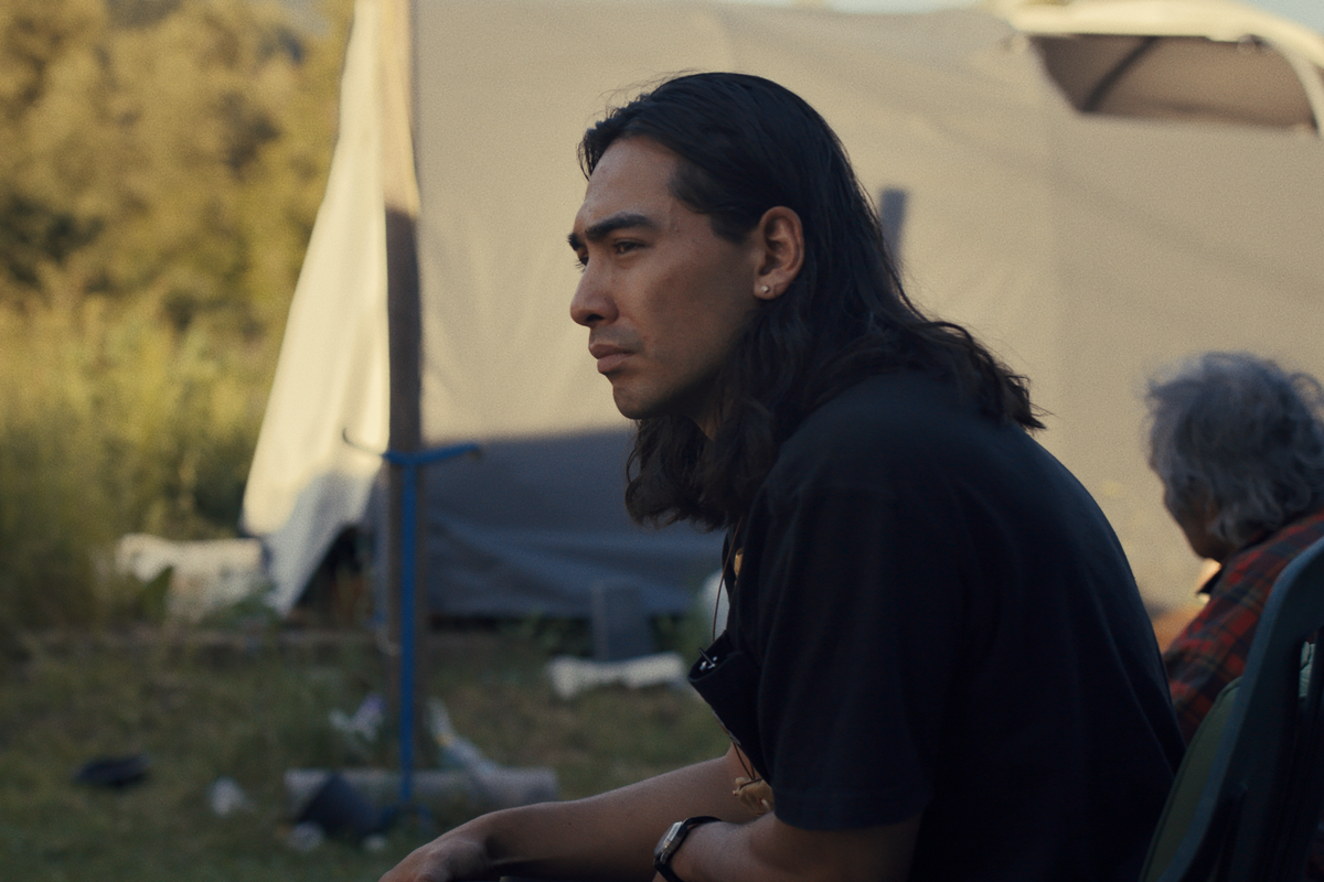 Julian Brave NoiseCat visits with family on the Mount Currie Indian reserve during a roadtrip with his father, Ed Archie NoiseCat, in the documentary“ Sugarcane.”  (Sugarcane Film LLC)
