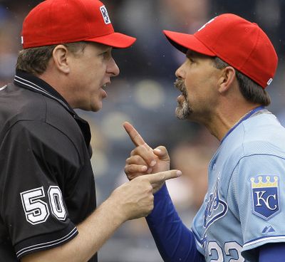 Royals manager Trey Hillman disputes spitting claim. (Associated Press / The Spokesman-Review)