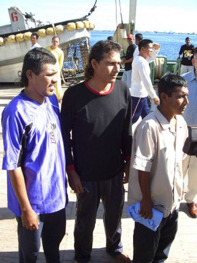 
From left, Mexican fishermen Jesus Vidana, Lucio Rendon and Salvador Ordonez arrive in the Marshall Islands on Monday after being rescued by an Asian fishing ship. 
 (Associated Press / The Spokesman-Review)
