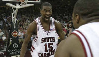 
South Carolina's Carlos Powell (15) hopes to celebrate an NIT championship tonight. The Gamecocks face Saint Joseph's in the final.
 (Associated Press / The Spokesman-Review)