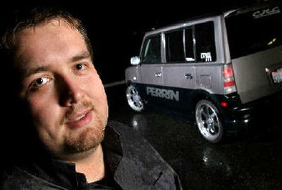 
University of Washington student David Fotheringham, 24, poses with his 2004 Scion XB in Bellevue Wash. 
 (Associated Press / The Spokesman-Review)