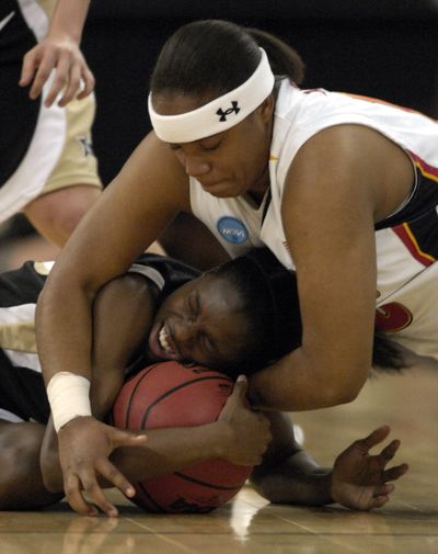 Vanderbilt’s Jessica Mooney and Maryland’s Anjali Barrett, top, battle for possession in second half.  (Associated Press / The Spokesman-Review)